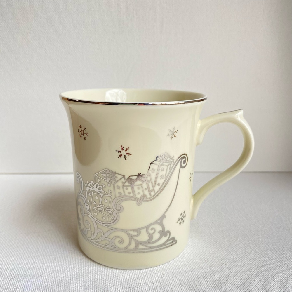 Lenox Sleigh of Surprises porcelain Christmas holiday mug in cream with silver